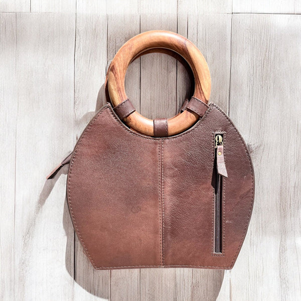 Large tan floral tooled leather handbag
